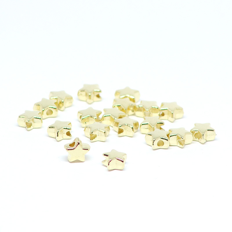 Perlen goldene Sterne 0,7 x 0,4 cm, 50 Stück