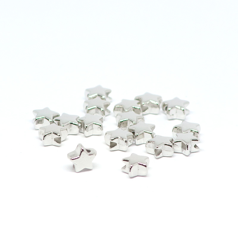 Beads silver stars 0,7 x 0,4 cm, 50 pieces