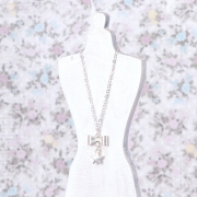 Necklace with star-ribbon-pendant